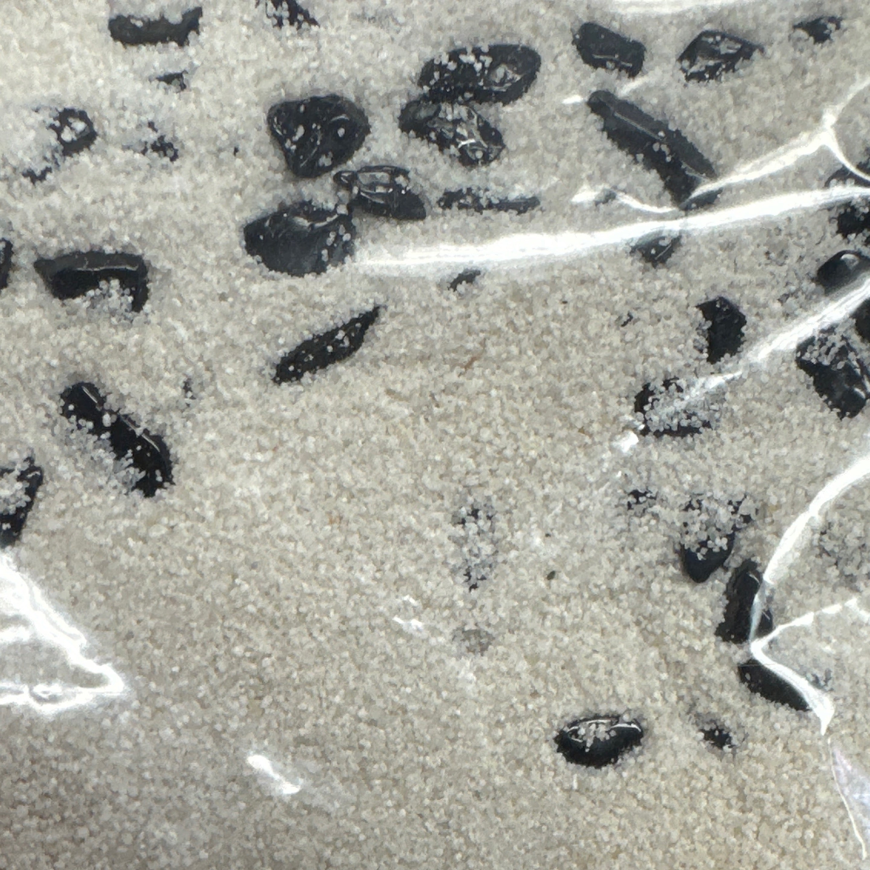 Smudging Sand with Tourmaline