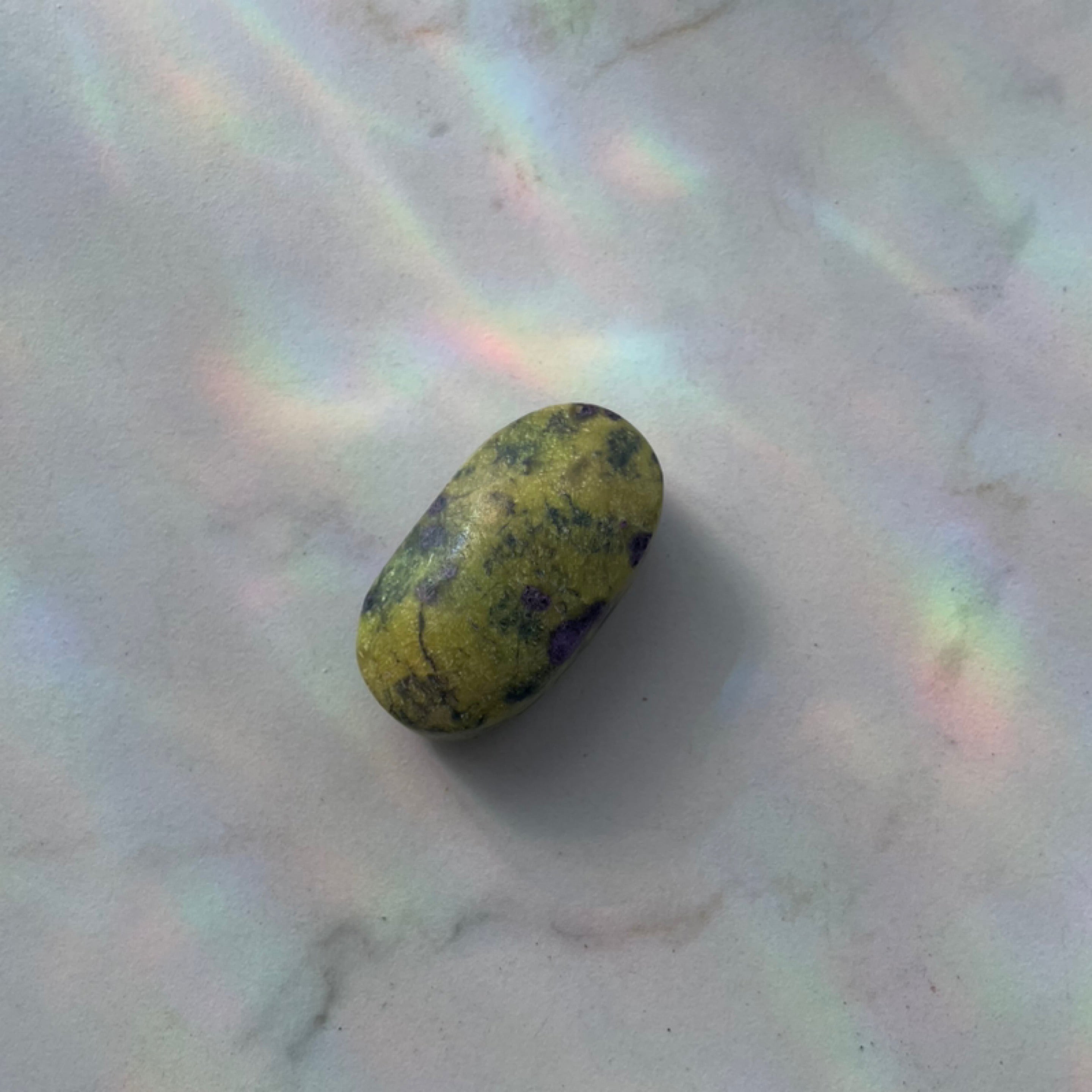 Atlantisite Palm Stone