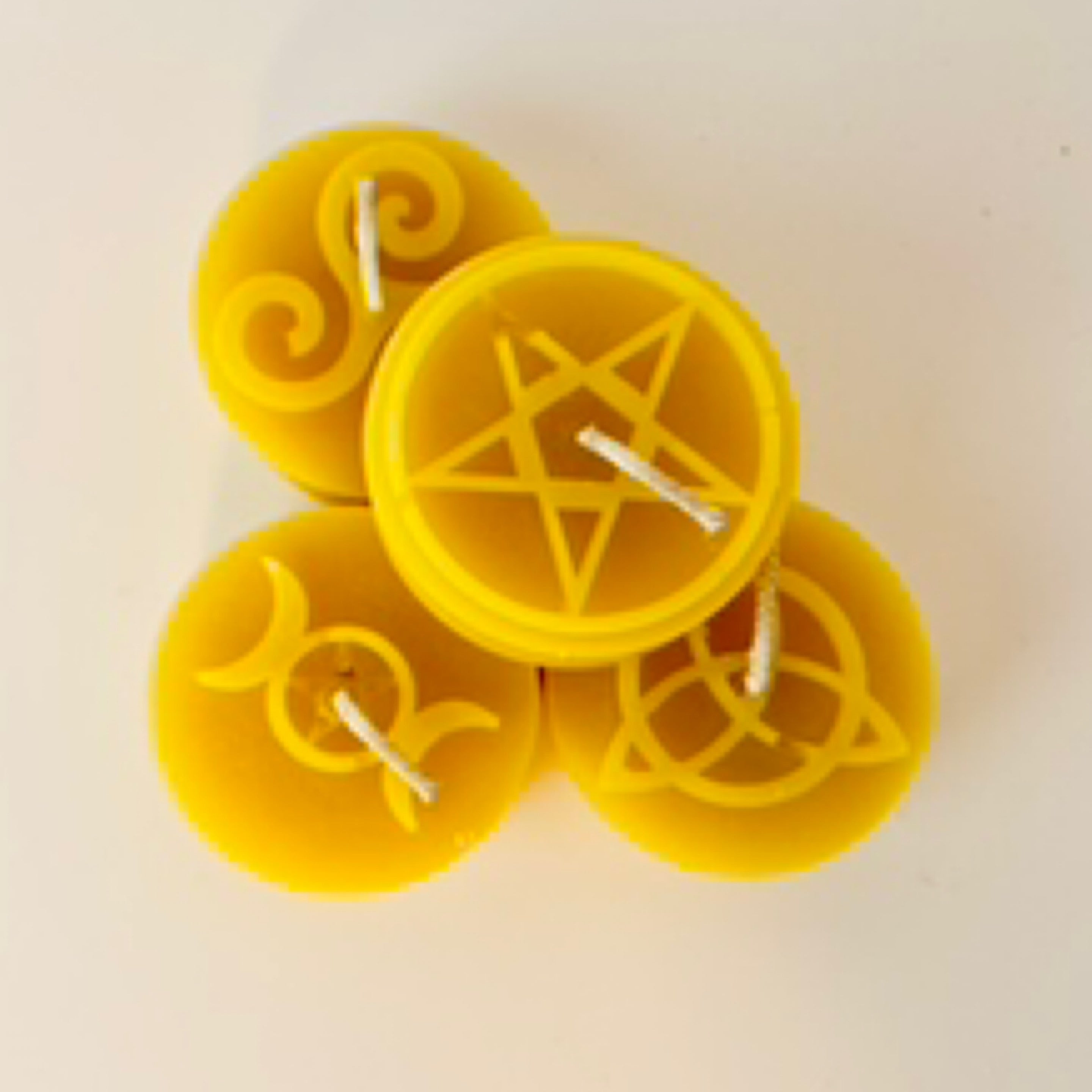 Beeswax candles with symbols